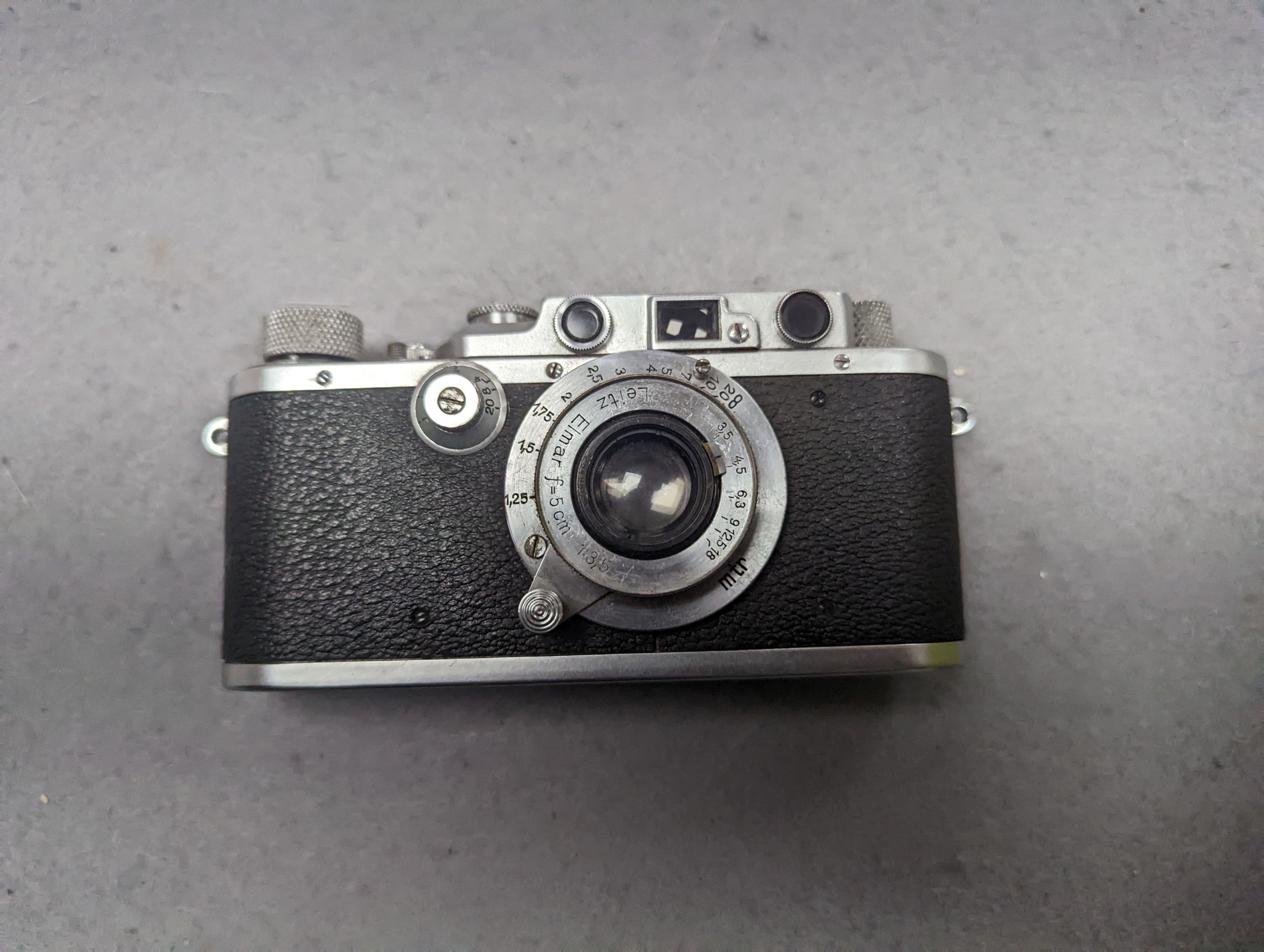 A 1936 Leica iiia camera, serial number 187984, with related effects to include lenses, filters etc